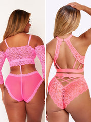 Pink lace lingerie set on a plain background