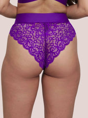 Purple lace lingerie set on a plain background